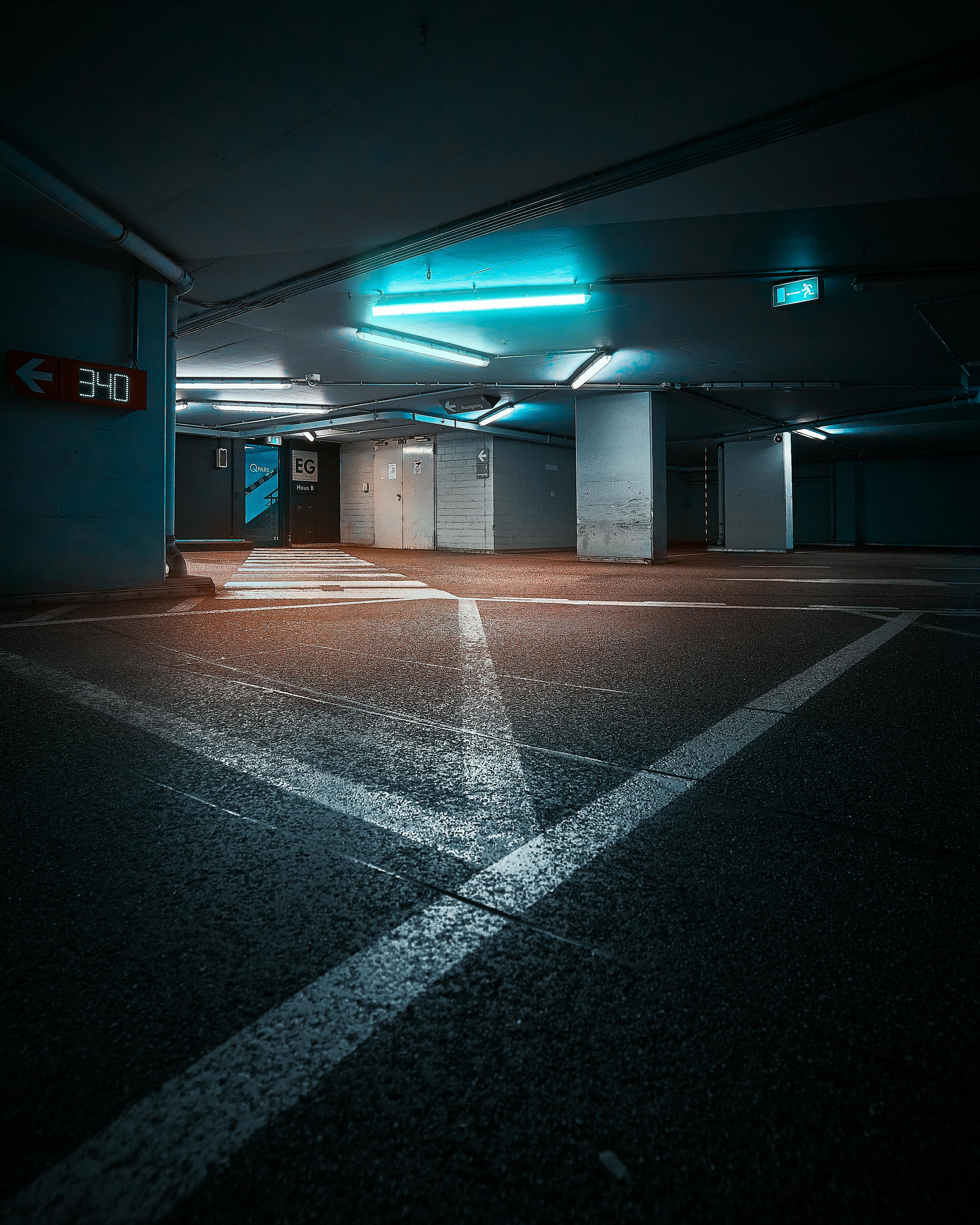 An Empty Parking Garage At A Night Time Background, Parking Garage Near Me  To Take Picture, Car, Garage Background Image And Wallpaper for Free  Download