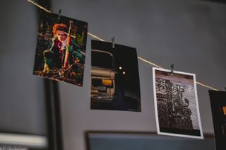 Photo prints hanging on a string — photo by Kristina Chuprina on Pexels