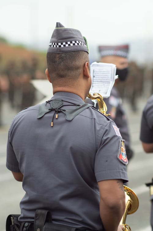 Free Back View of a Police Man Stock Photo