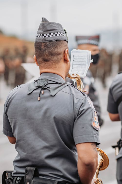 Free Back View of a Police Man Stock Photo