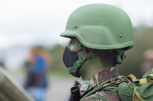 Close Up Shot of a Man Wearing Combat Helmet