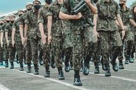 Soldiers Marching with Firearms