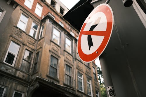 Free Low-Angle Shot of a Traffic Sign on a Metal Post Stock Photo