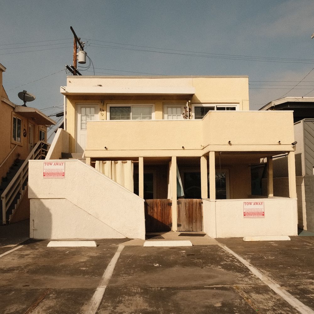 Nunney — professional movers carrying furniture on a house move