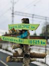 Street signs Made of Wooden Logs Screwed on a Wood Pole