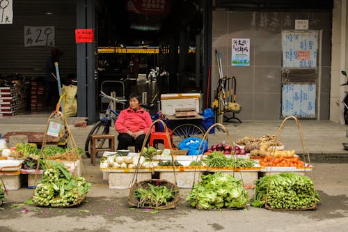 Free Man Selling Vegetables on the Street Stock Photo