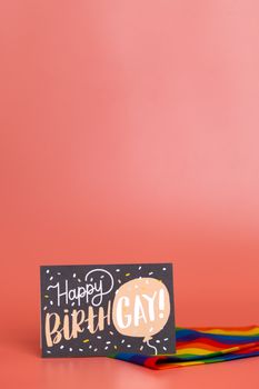 Celebrate Pride with this vibrant LGBTQ+ birthday card featuring a rainbow design on a warm background.