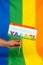 Hand Holding LGBT Slogan
