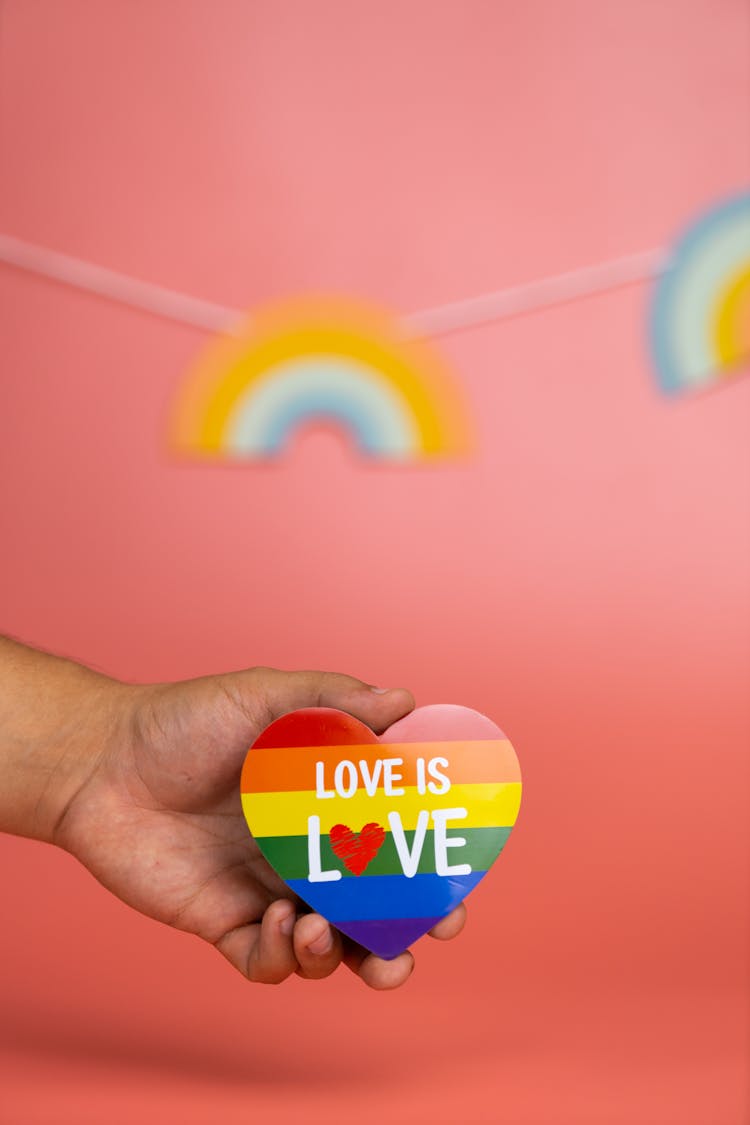 Hand Holding Rainbow Heart 