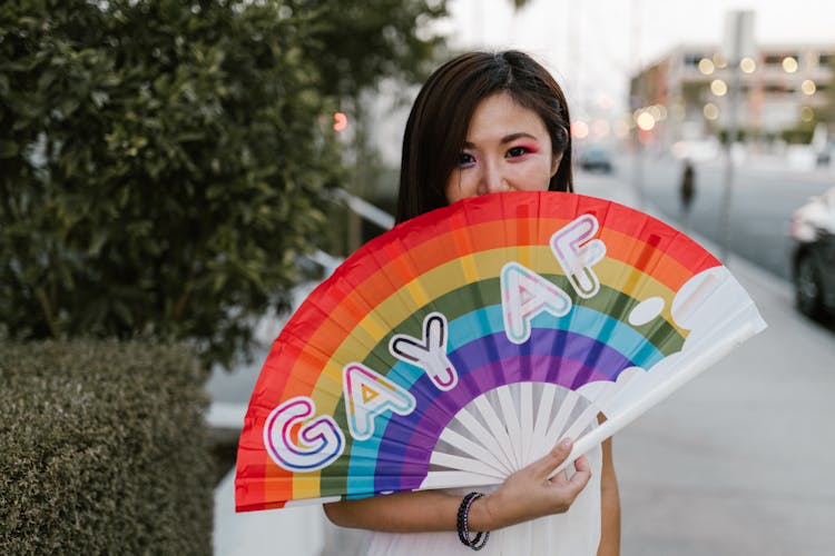 Woman Holding Pride Flag Handheld Fan