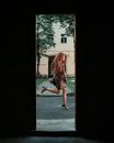 A Woman in High Heels Hopping