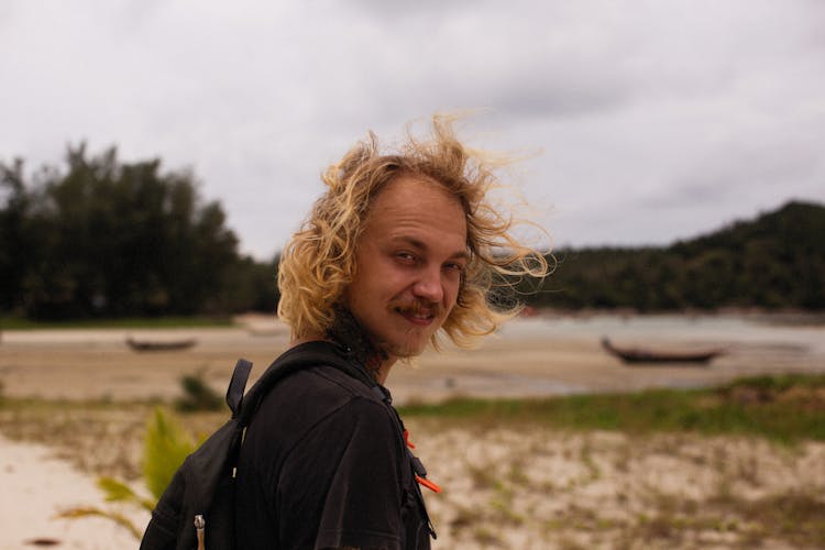 Portrait Of A Man Looking Over His Shoulder