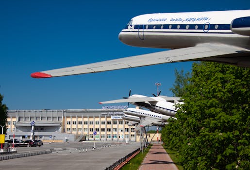 Scenic view of vintage airplanes on display outside a Russian airport terminal.