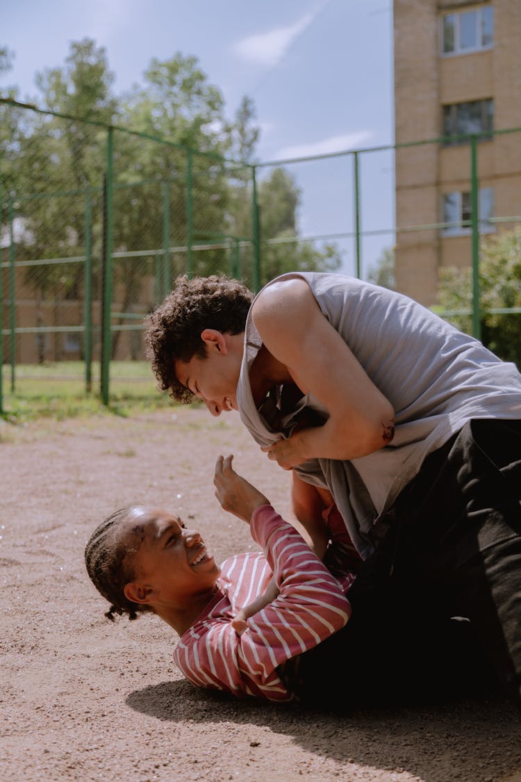 Friends Playing In The Playground