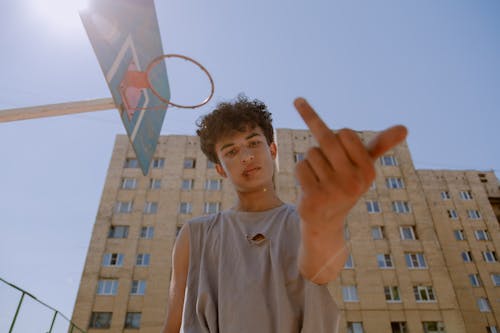 A Boy Showing His Middle Finger