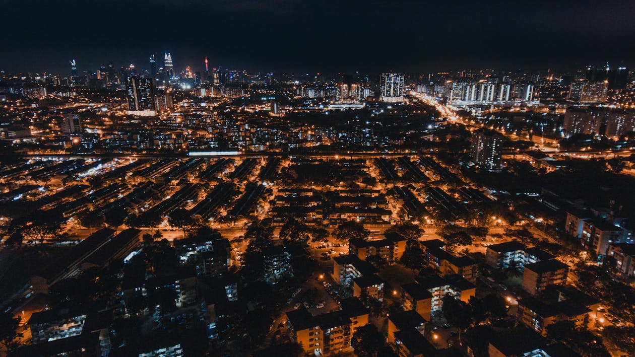 Aerial Photo of City Buildings during Night Time