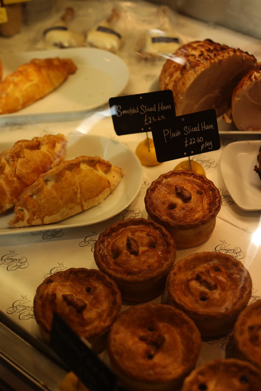 A close-up bakery display of pies and pastries, where the classics and the experiments have to earn the same shelf space.