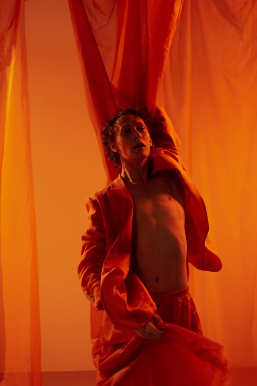 Man Dancing Between Fabric 