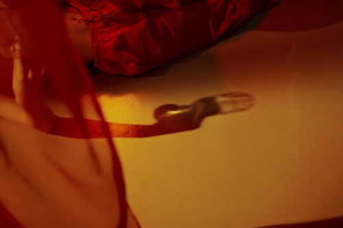 Free Abstract image with warm tones featuring red fabric and shadow play. Stock Photo