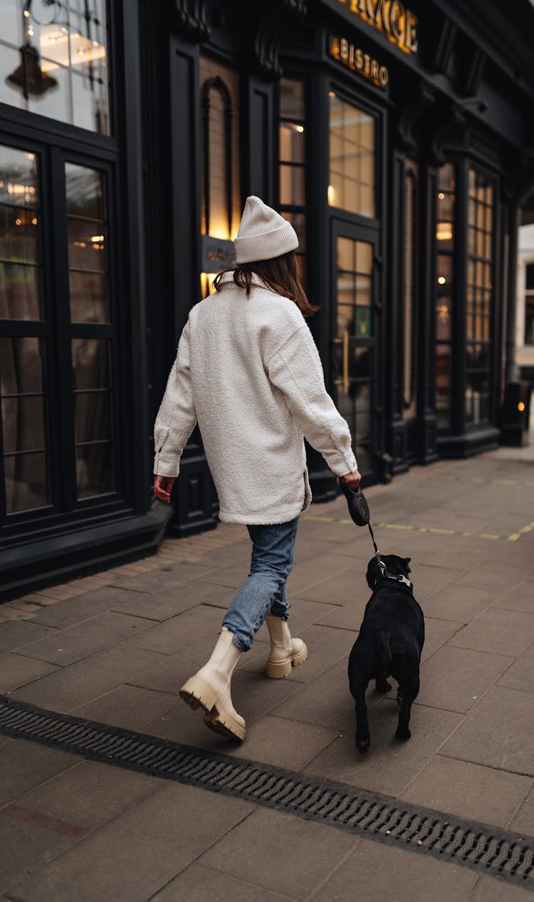 Woman Walking With Dog