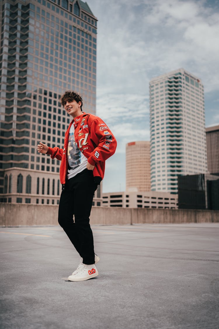 Smiling Man In Red Jacket