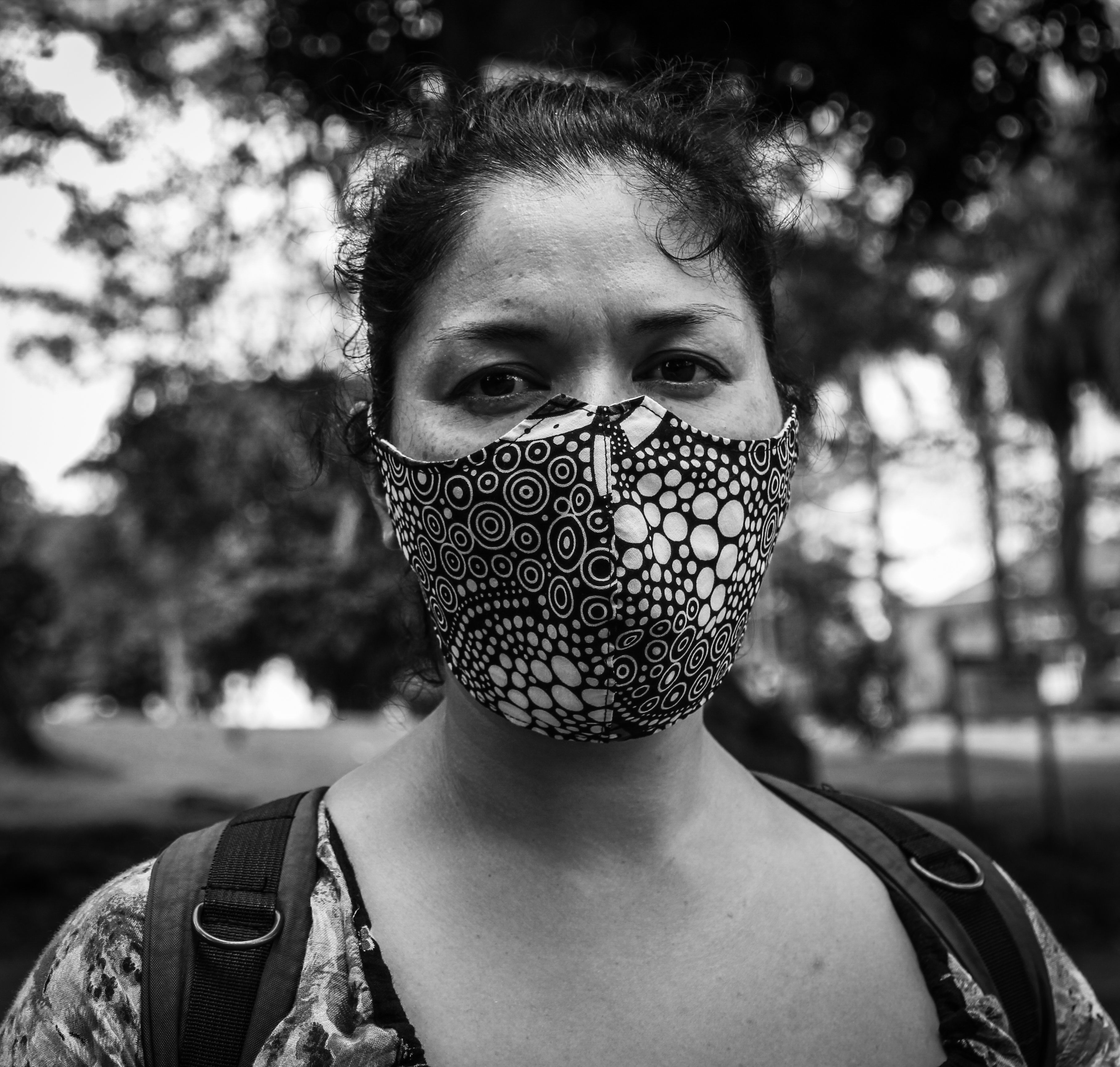 Grayscale Photo of a Woman Wearing a Face Mask · Free Stock Photo