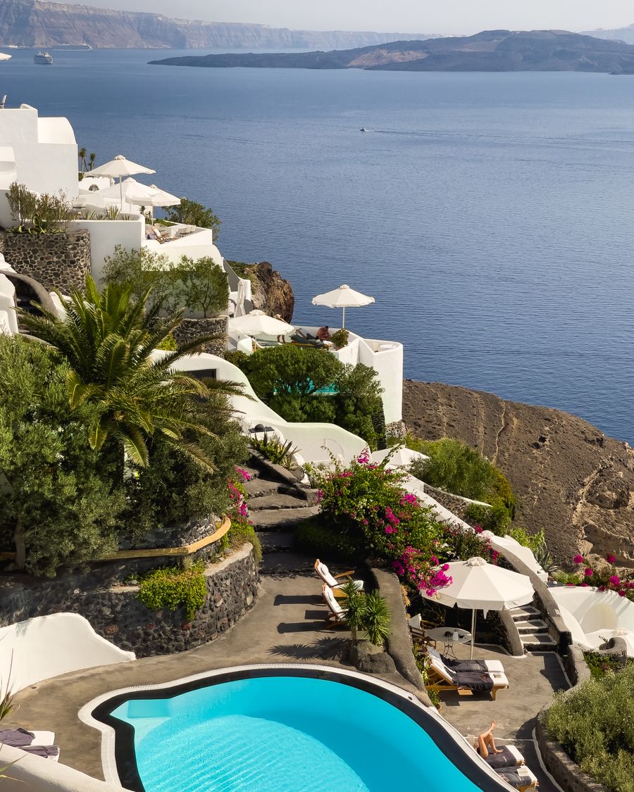 Oia cliffside resort pool Santorini
