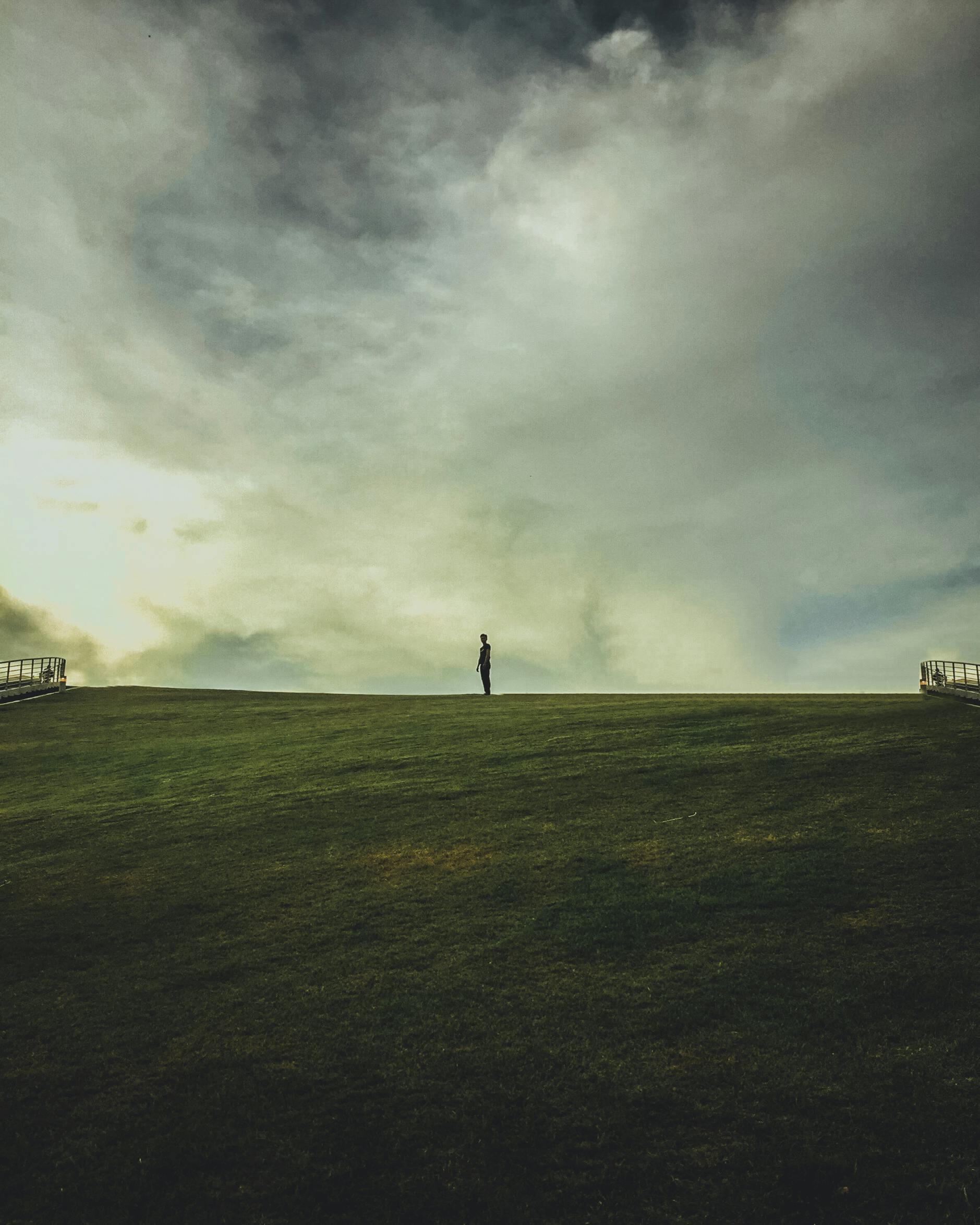 Person on Green Grass Field · Free Stock Photo