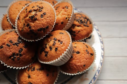 Free Brown Cupcakes on White Ceramic Plate Stock Photo