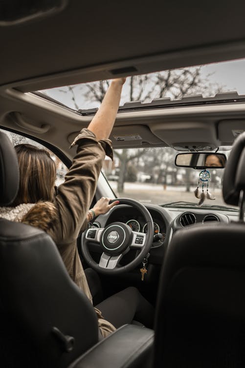 Woman Driving a Car