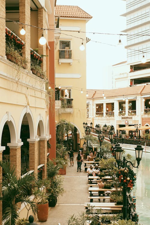 Town Street with Cafe Tables by a Canal