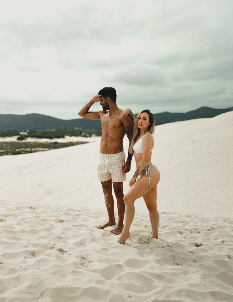 Couple Posing On Beach