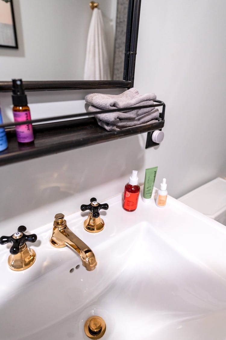 Beauty Products On Bathroom Sink