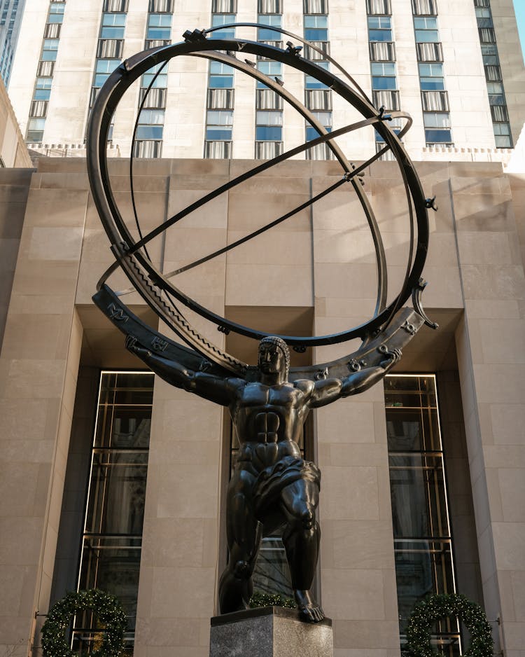 The Atlas Statue Carrying An Armillary Sphere Located In Manhattan, New York