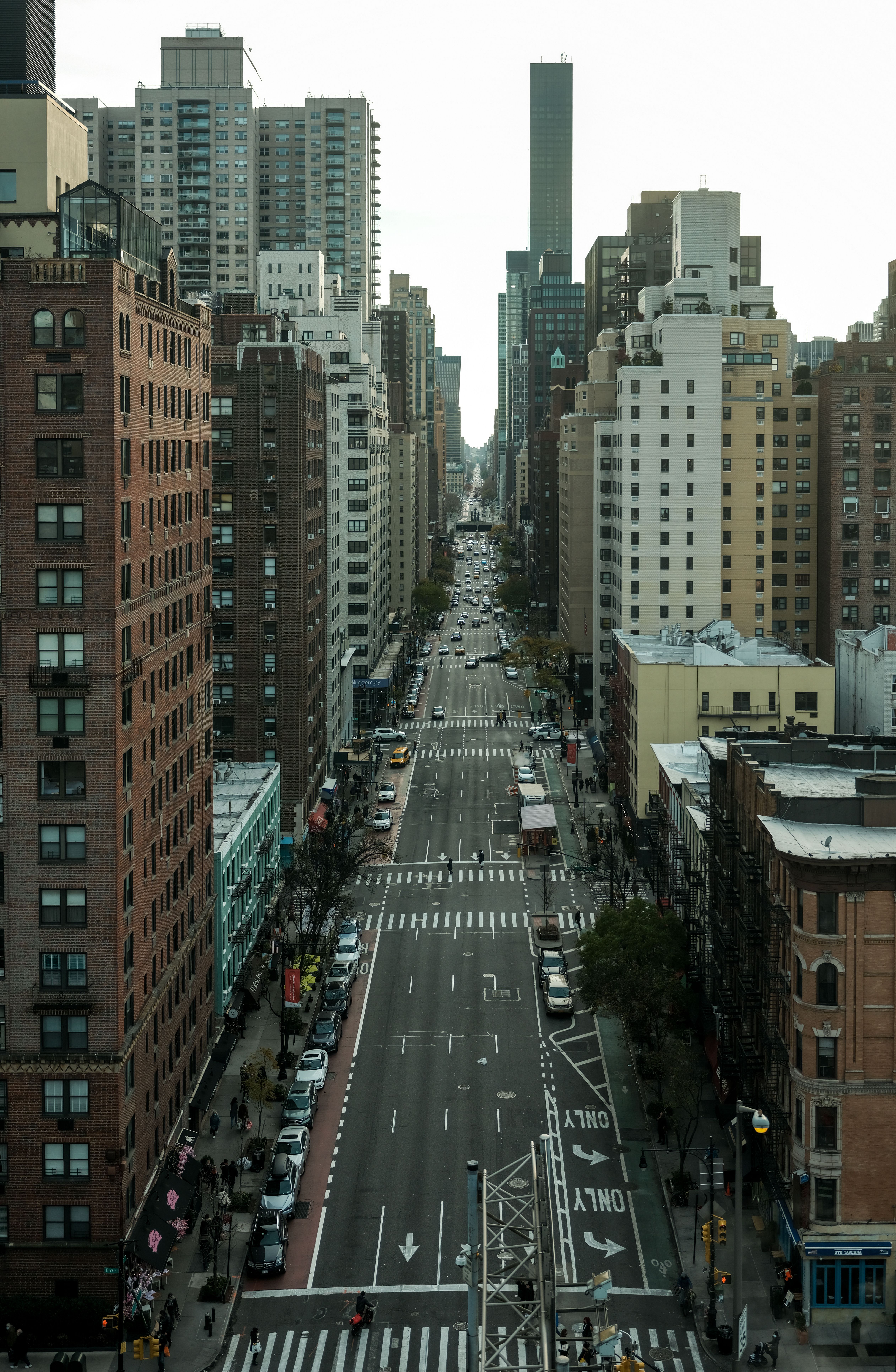 An Aerial Photography of Cars Parked on the Street Near the City ...