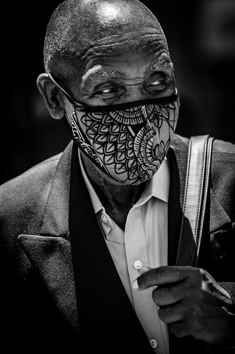 Close-up Shot Of An Elderly Man Wearing A Face Mask