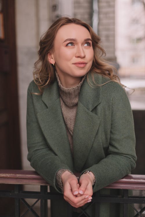 Free Portrait of Woman in Green Coat Stock Photo