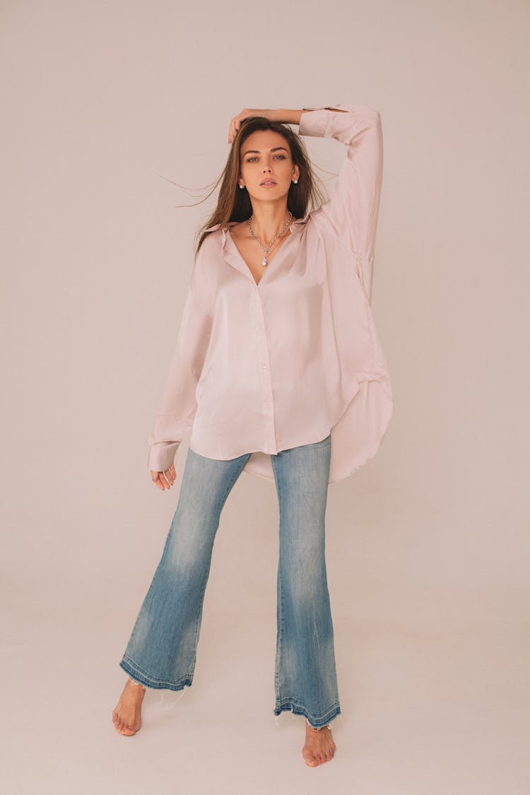 Woman In Shirt And Jeans