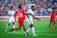 Soccer players competing fiercely during a match in Mogadishu, Somalia.