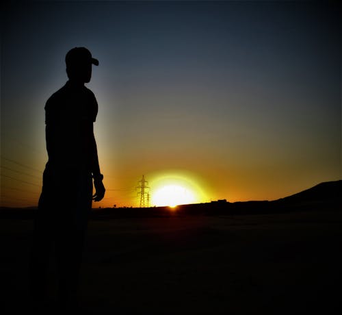 Free Gratis lagerfoto af Dreng, solnedgang Stock Photo