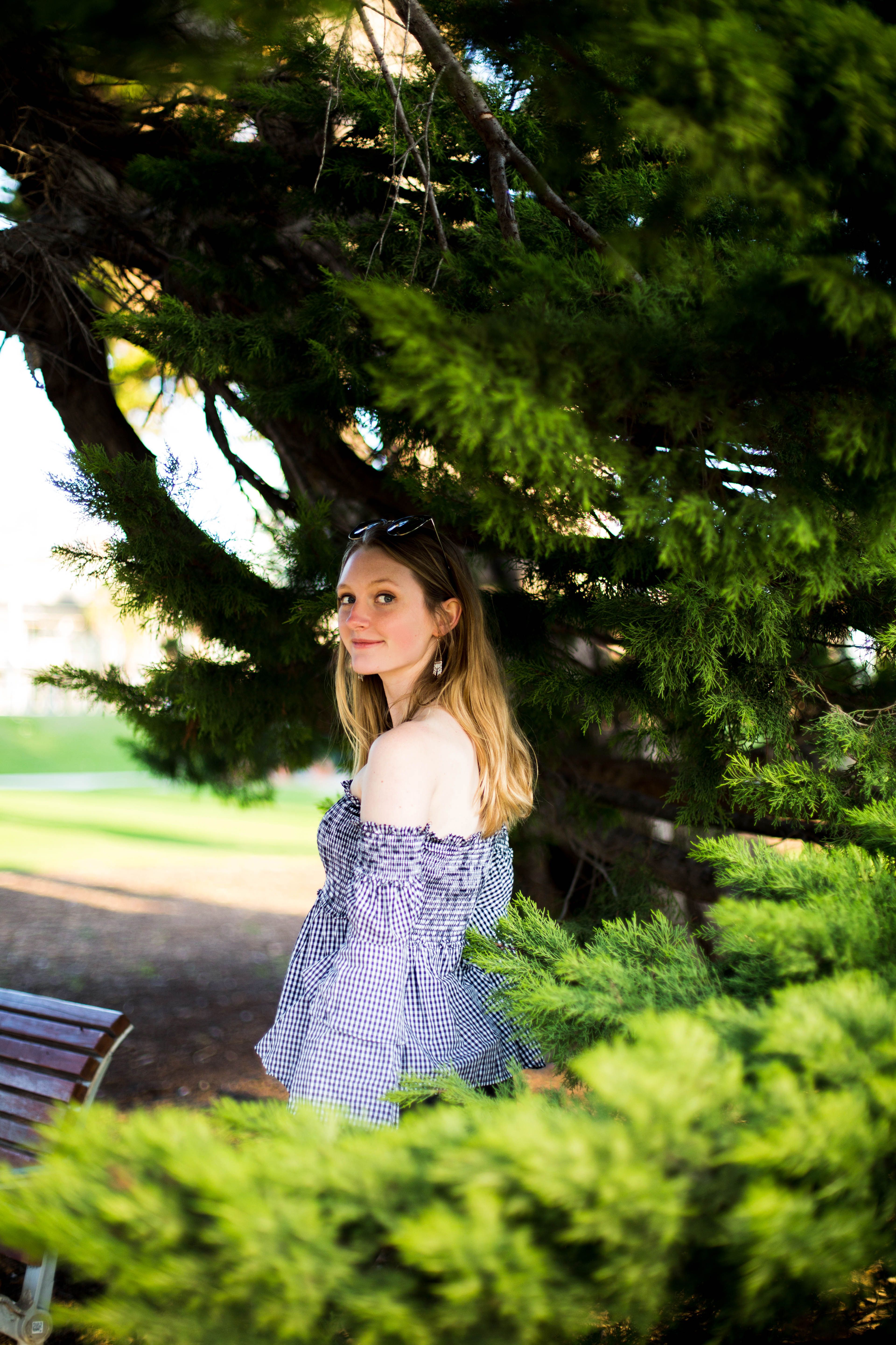 Woman Posing near Trees in Park · Free Stock Photo