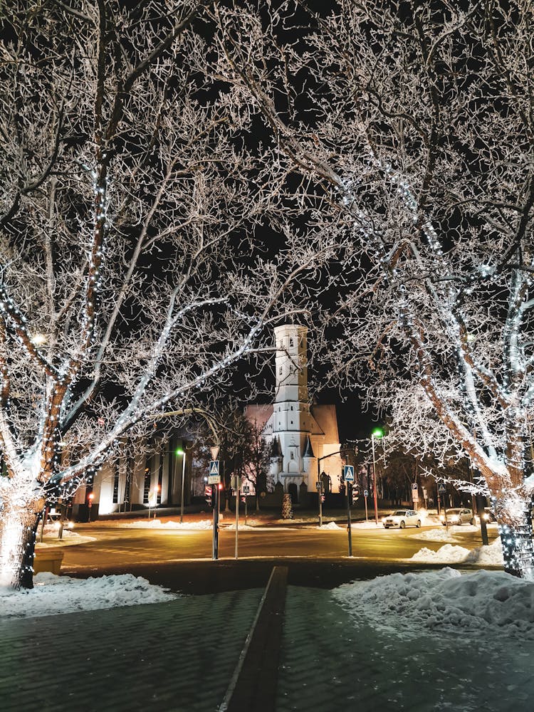 City Square In Snow At Night