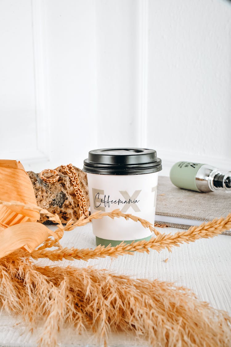 Coffee In Takeaway Cup On Table