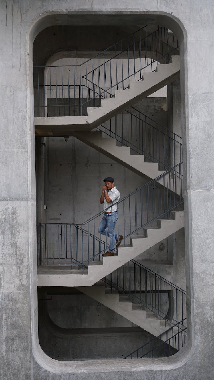 Man Going Down The Stairs