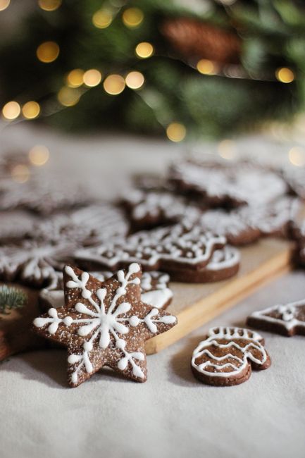 Delicious gingerbread cookies decorated with icing, perfect for holiday celebrations.