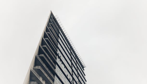 Low-angle view of a modern high-rise building in Kyiv showcasing architectural design.