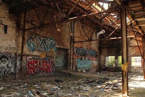 Free Graffiti on Wall of an Abandoned Decaying Building Stock Photo
