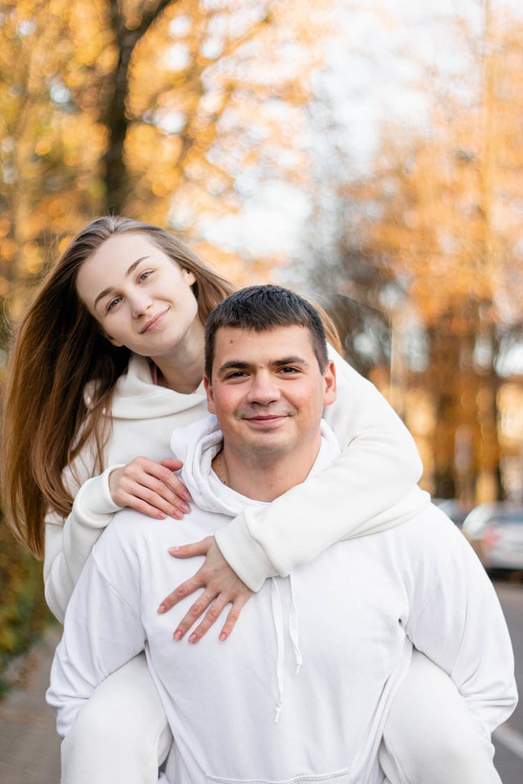 Man And Woman In White Clothing