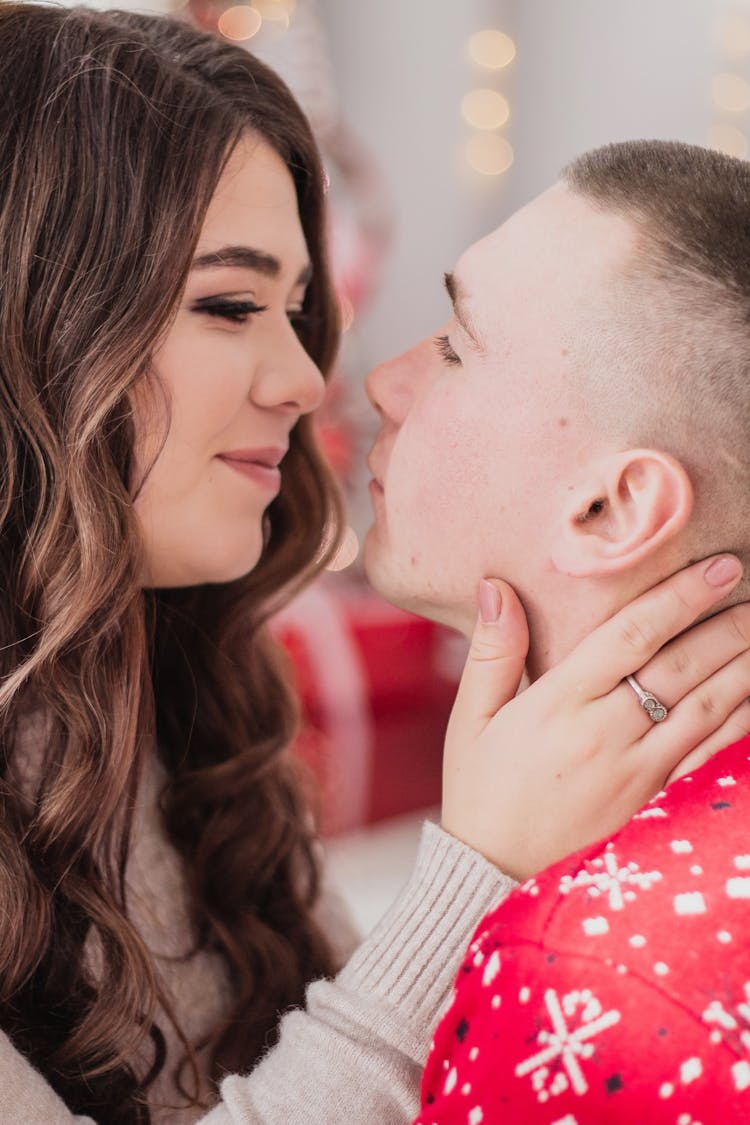 A Close-up Shot Of A Couple Facing Each Other