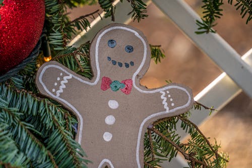 A Cardboard Ginger Man Cutout on a Christmas Tree